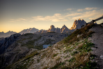 Fototapeta na wymiar Rifugio Auronzo at sunrise Hiking trail to the Drei Zinnen Hütte in the Dolomites in South Tyrol, Italy.