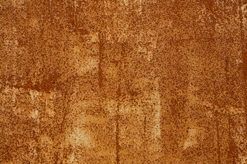 Old rusty metal surface with peeling paint.