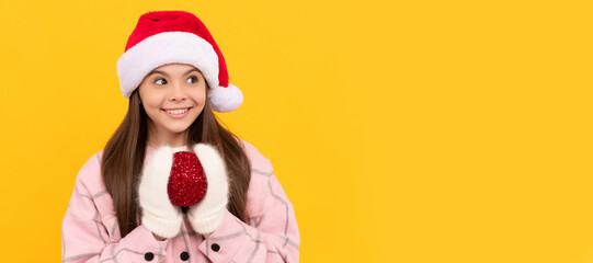 xmas holiday decoration. child wearing warm clothes. happy new year. merry christmas. Banner of christmas child girl, studio kid winter portrait with copy space.