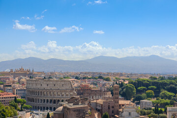 Fototapeta na wymiar Rome skyline: Colosseum and Imperial Forum.