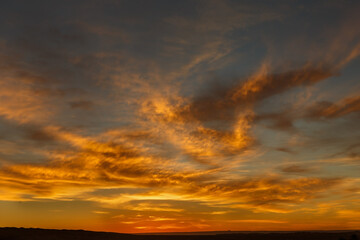 Sunset in the Sahara Desert. Beautiful sky. dramatic sunset in the desert