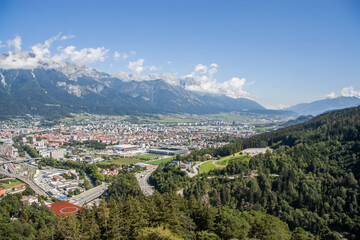 View of the city of Innsbruck, the capital of the 1964 and 1976 Olympic Games from the Bergisel hill tower of the sports complex and the Alps in the background