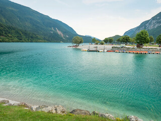 Yacht and paddleboard port at beautiful Molveno town and Molveno lake