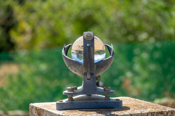 Heliograph, a meteorological instrument used to record the duration and intensity of the sun's rays