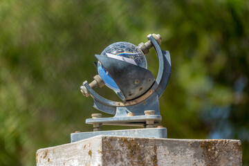 Heliograph, a meteorological instrument used to record the duration and intensity of the sun's rays