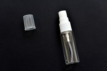 Glass empty bottles on a black background close-up. Pharmacy bottles in the afternoon in a group.