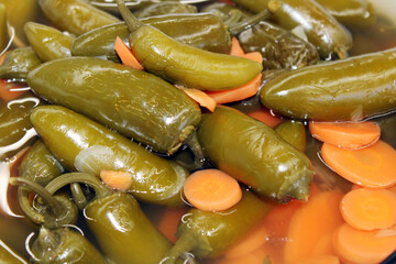sample of traditional spicy pickled chilies to accompany Mexican food