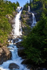 Plakat waterfall in val genova, in italy