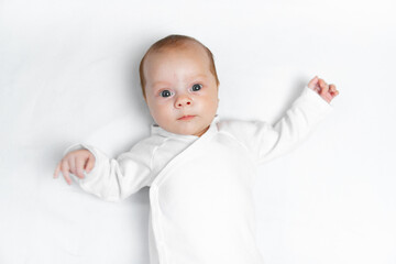 Portrait of a baby on a white background . Children of copyspace . An article about children . Advertising of children 's products .