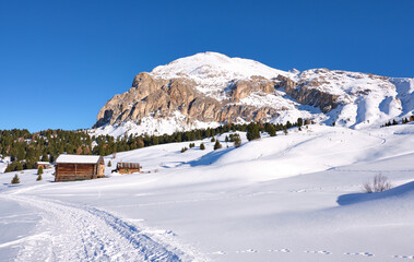 mountains in val di fassa in winter, with snow