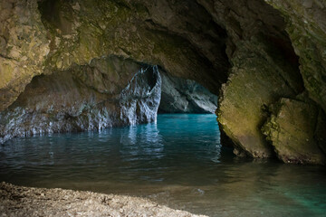 Cliffs and water in the cave at Myrtos Beach at the island of Kefalonia