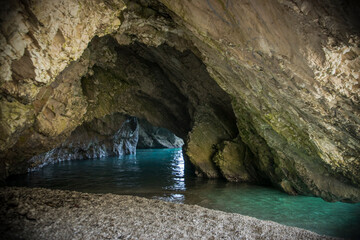 Cliffs and water in the cave at Myrtos Beach at the island of Kefalonia