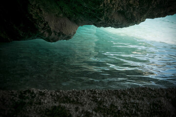 Cliffs and water in the cave at Myrtos Beach at the island of Kefalonia