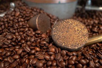 Selective focus at heap of roasted coffee bean. 