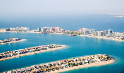 Fototapeta premium The Palm Jumeirah. Holidays villas and luxury hotels view at sunset. Dubai, UAE