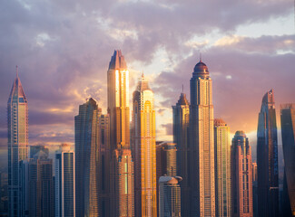 Dubai Marina skyscrapers view at golden sunset. Dubai, UAE.