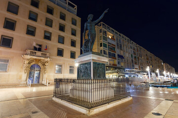 Genius of navigation. Bronze statue in Toulon, France. Blue Coast