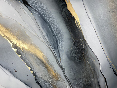 Abstract fluid art in light and dark grey tones with subtle gold accents. Alcohol ink, organic swirls, marbling effect. No real property or natural materials depicted.
