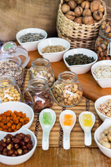 Assortment of nuts on rustic wood table