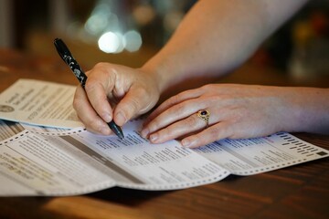 Female voting for a candidate during the elections