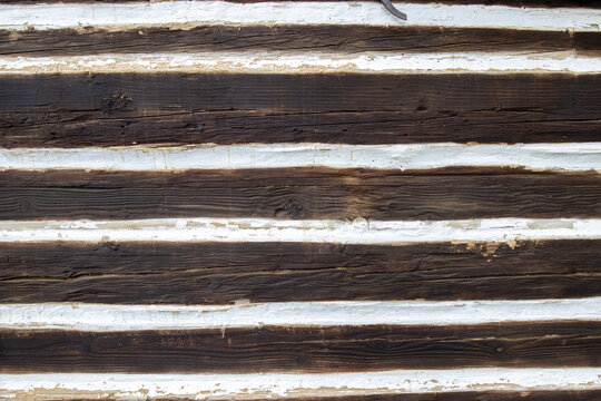 White painted clay and wooden bars background