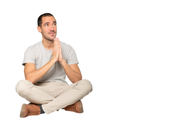 Happy young man praying gesture