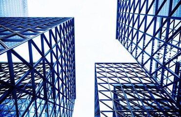 Glass building. Transparent glass wall of modern office building. Modern office building with glass facade on a clear sky background. 3d Rendering