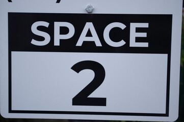 Sign with numbers for parking spots