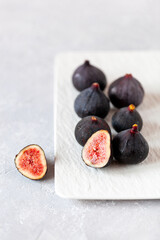 Fresh ripe figs on a square plate