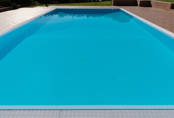 blue rectangular swimming pool in hotel resort