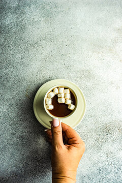 Anonymous peron with mug with hot chocolate