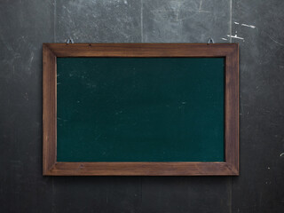 Blackboard concept on a wall