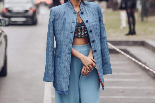 Street Style, Woman Wearing A Blue Striped Print Pattern With Embroidered Sequined Oversized Jacket, High Waist Pale Blue Wide Legs Pants.