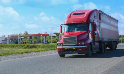 Fototapeta na wymiar American truck moving on the road