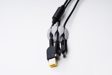 Cable Holder On Desk With Charging Cables