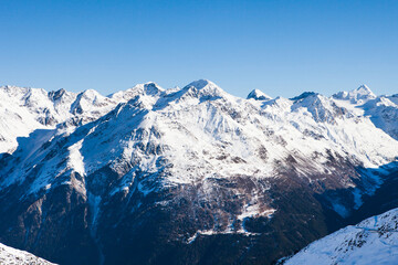 Fototapeta na wymiar Winter Landscape Of A Ski Resort In The Alps