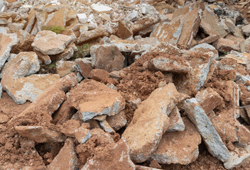 Brick and rubble on a cobbled road in Thailand