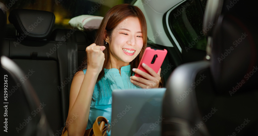 Wall mural businesswoman use phone in car