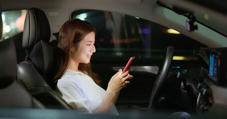 businesswoman use smartphone in car