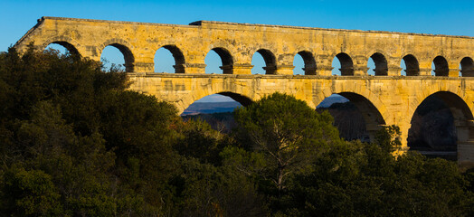 Obraz premium Picture of old Roman Bridge Pont du Gard in autumn in South of France