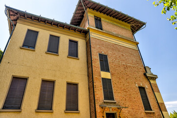 Fototapeta na wymiar Modena, Italy - July 9, 2022: Exteriors of a villa in Modena Italy 
