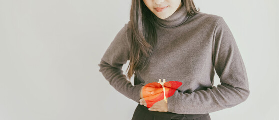woman with liver pain, hepatitis vaccination, liver cancer treatment, world hepatitis day