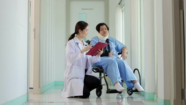 Female doctor taking notes on treatment of obese female patients Stiff neck with soft splint to support the neck. Concept of medical services in hospitals.