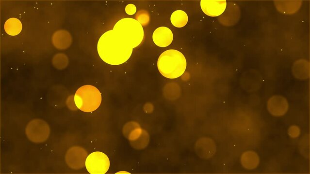 Animated background with lights and light particles on blurred background. Abstract animation with golden light particles floating across the screen
