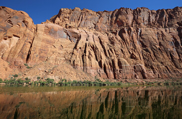 Fototapeta na wymiar The cliffs and reflection - kayaking Horseshoe Bend on Colorado River, Page, Arizona