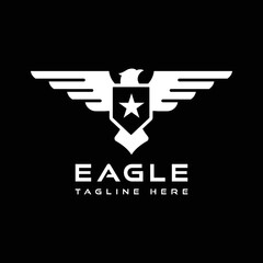 Obraz premium eagle silhouette logo design with shield and star