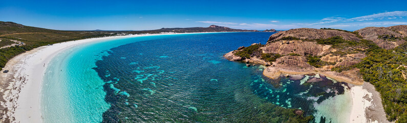 Naklejka na ściany i meble Aerial view of the white beach and crystal clear turquoise waters of Lucky Bay
