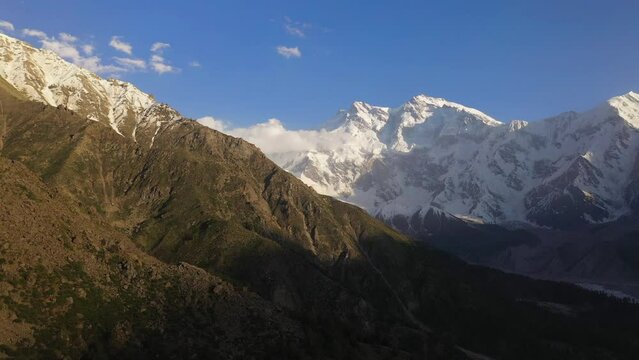 Drone shot of Nanga Parbat, Fairy Meadows Pakistan, snow capped mountains, cinematic aerial shot