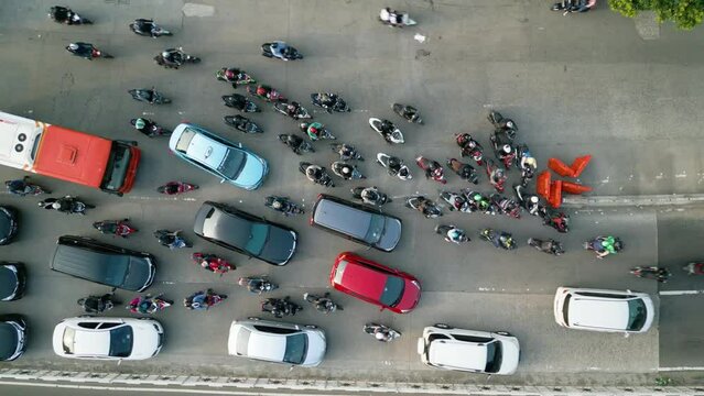 Top down view of vehicles move slowly on rush hour