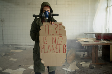 Homemade poster at environmental rally. A homemade sign, saying there is no planet b, survivor in...